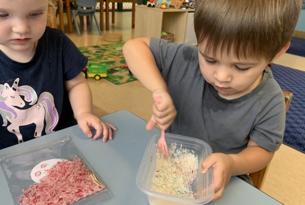 Creating no mess sensory bags in Dolphins room at Bright kids Early Learning Centre at Nerang.
